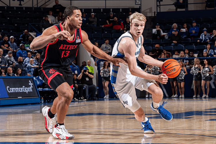 two basketball players for the aztecs